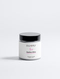 Sayory Heather Bliss Candle – brandend met heide en roze deken op keramisch plateau