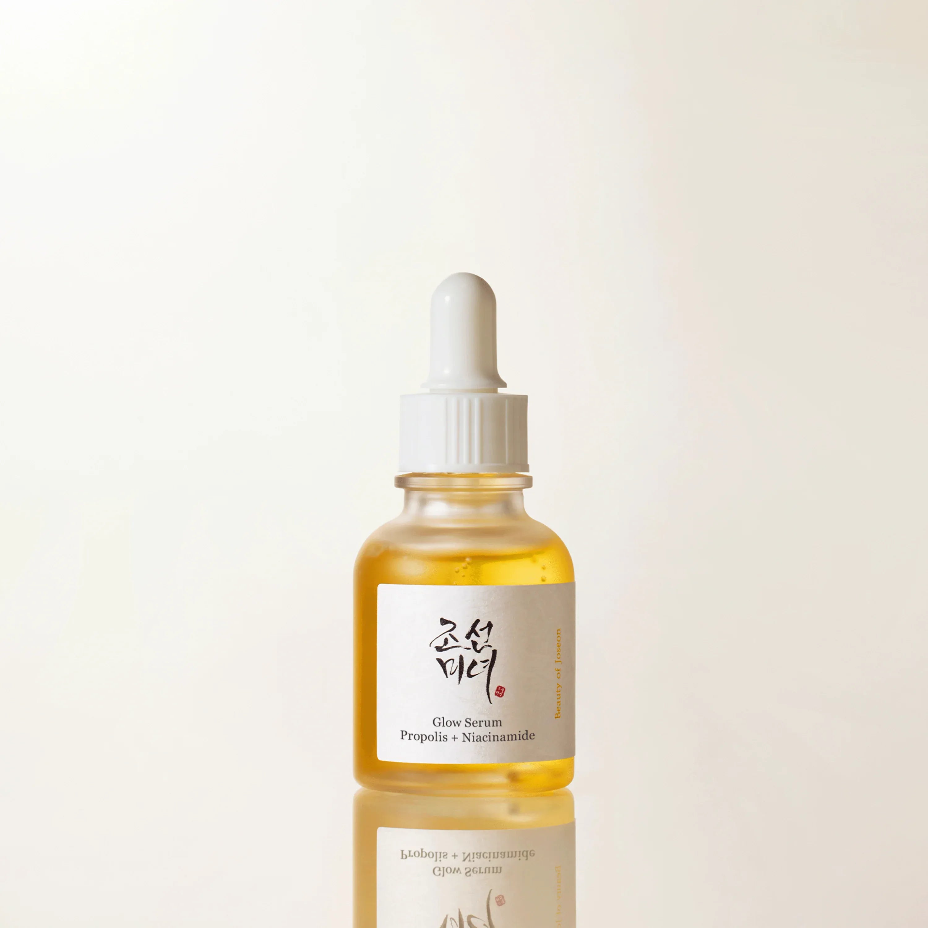 Beauty of Joseon Glow Serum - Skincare serum bottle with dropper on a light beige background