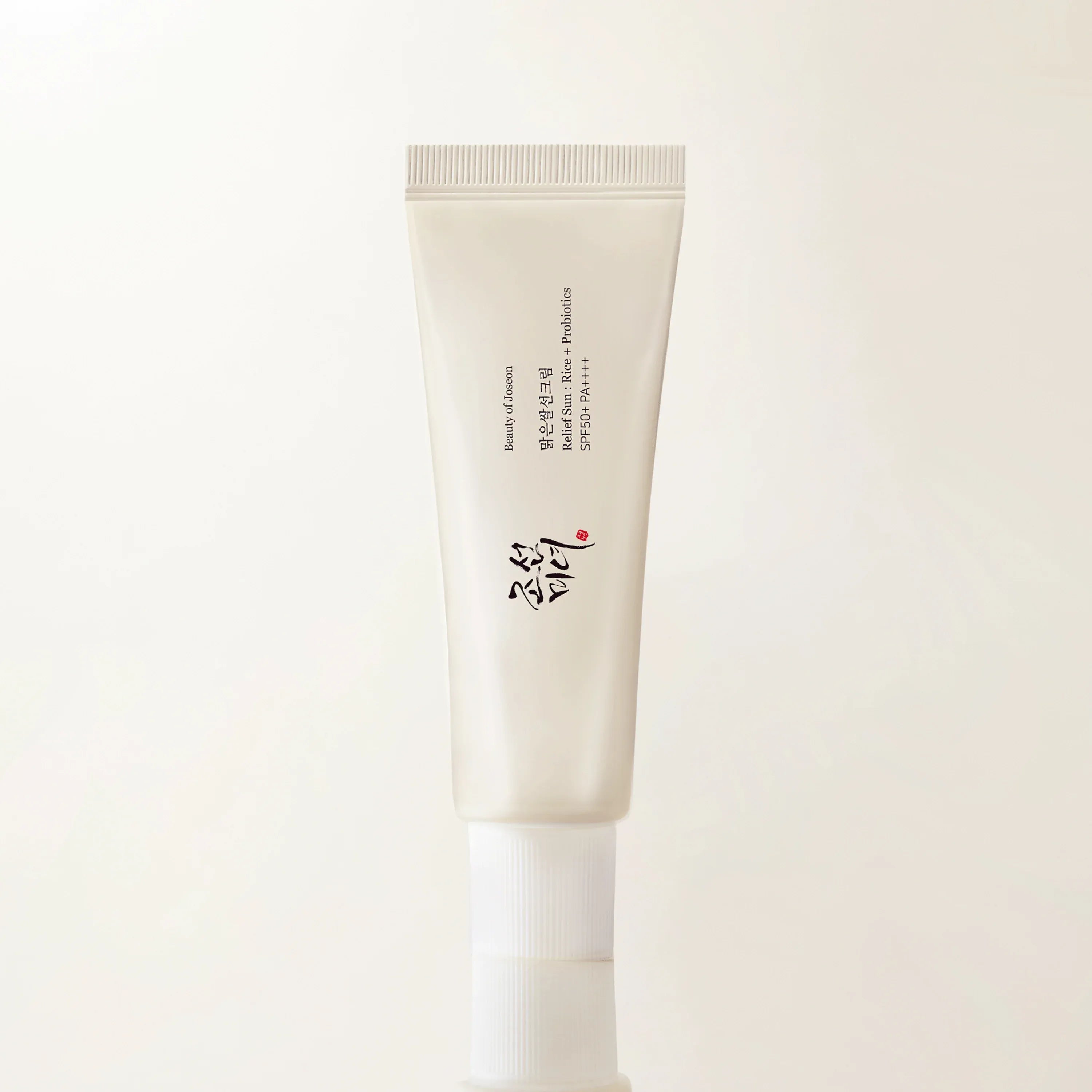 Tube of skincare product with a white background